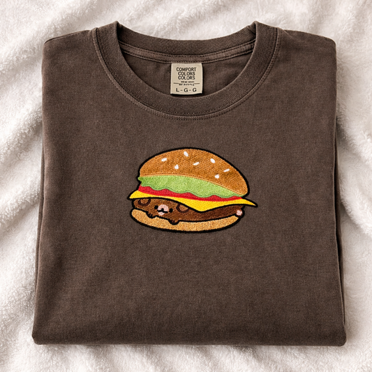 Espresso t-shirt with a hamburger design on a white textured background