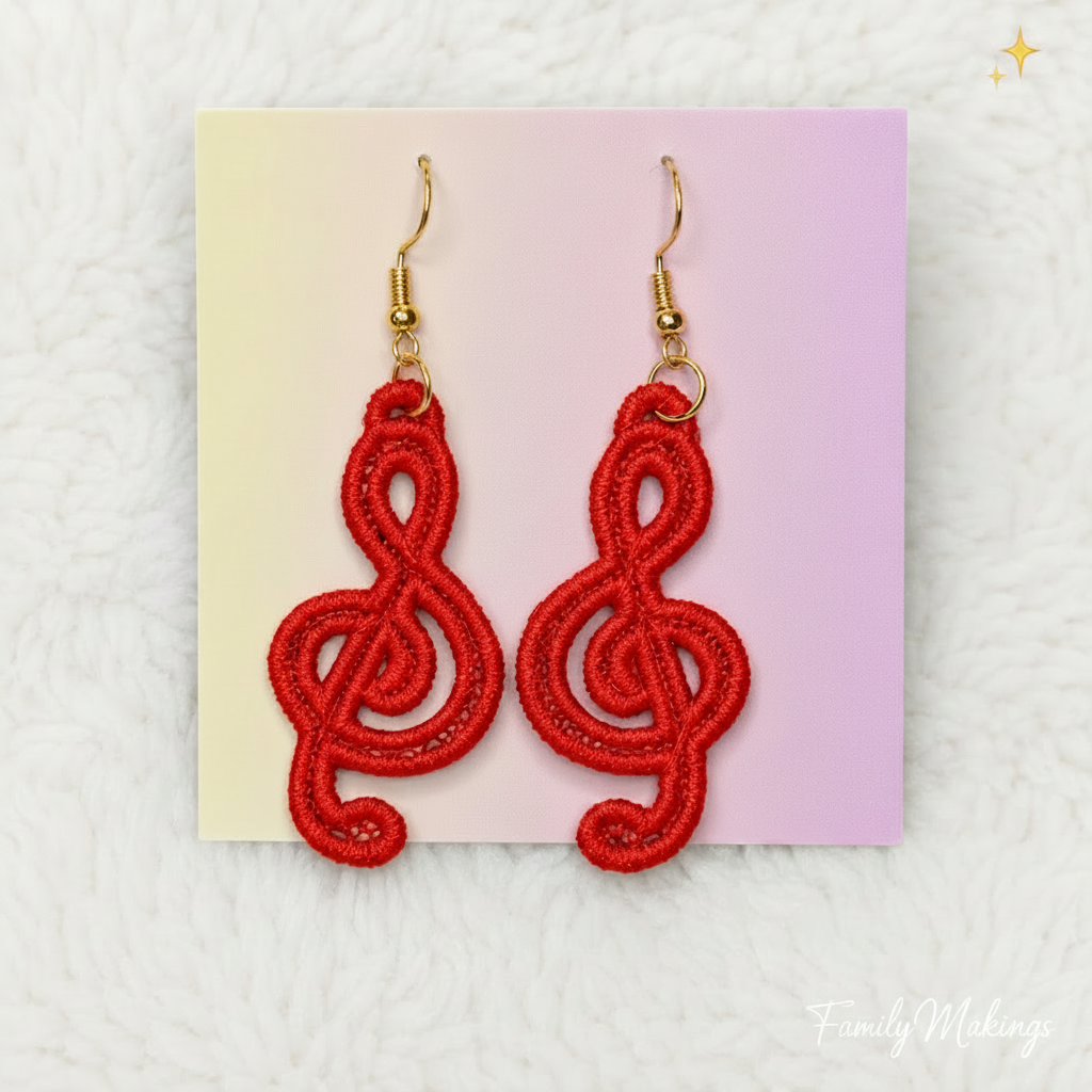 Red Treble Clef embroidered earrings on a card