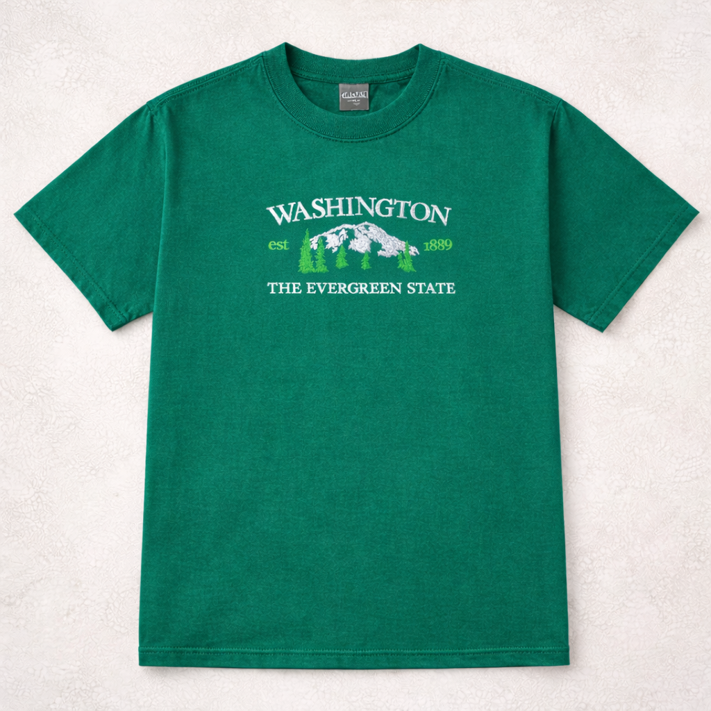Emerald t-shirt with 'Washington The Evergreen State' design on a light gray background