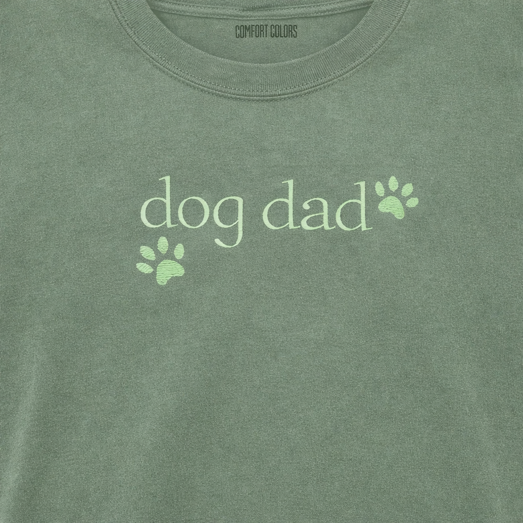 Sage t-shirt with 'dog dad' embroidered text and paw prints 