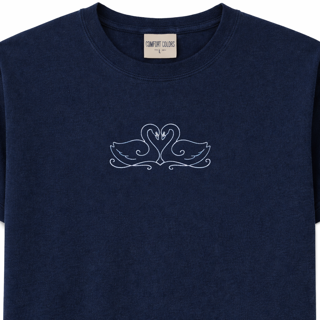 Navy t-shirt with a white design on a white background