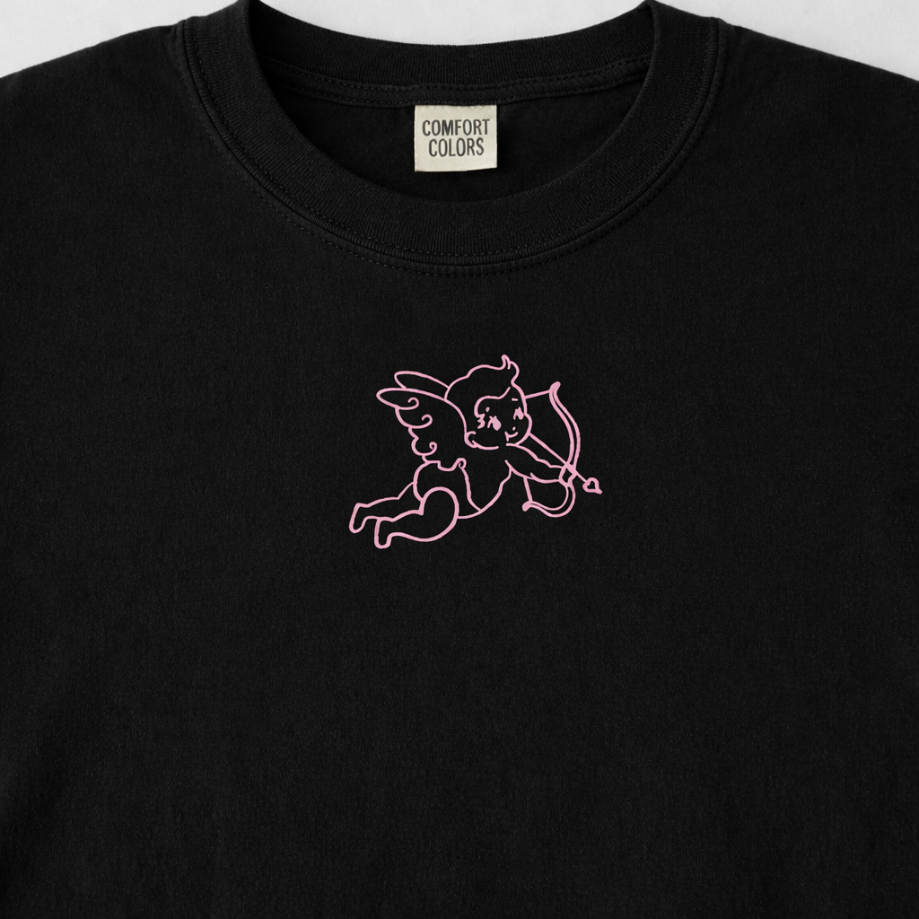 Black sweatshirt with a pink embroidered design on a white background