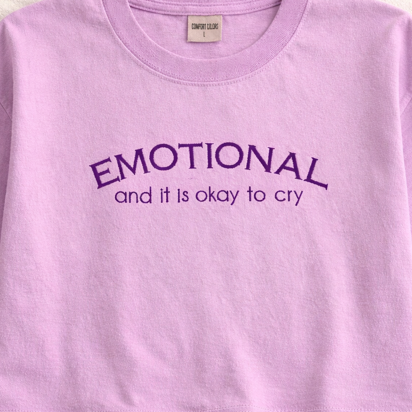 Orchid t-shirt with motivational embroidered text on a light background