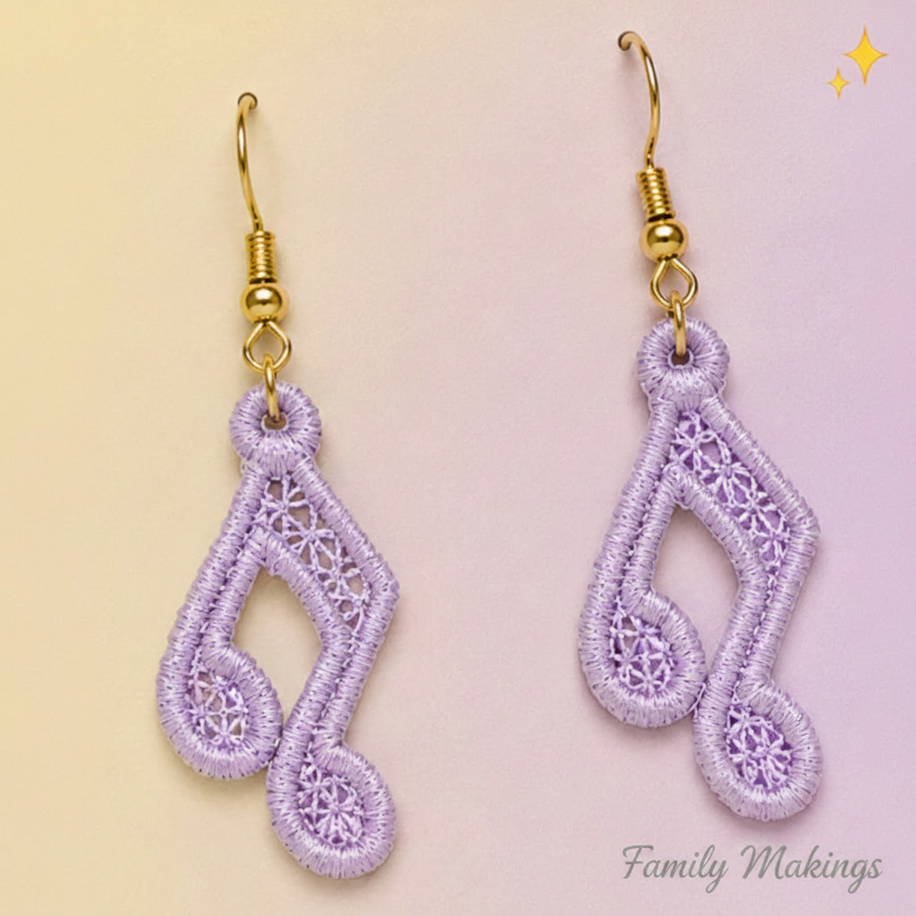 Beamed Eighth Note embroidered earrings with lavender thread and gold posts on a card 