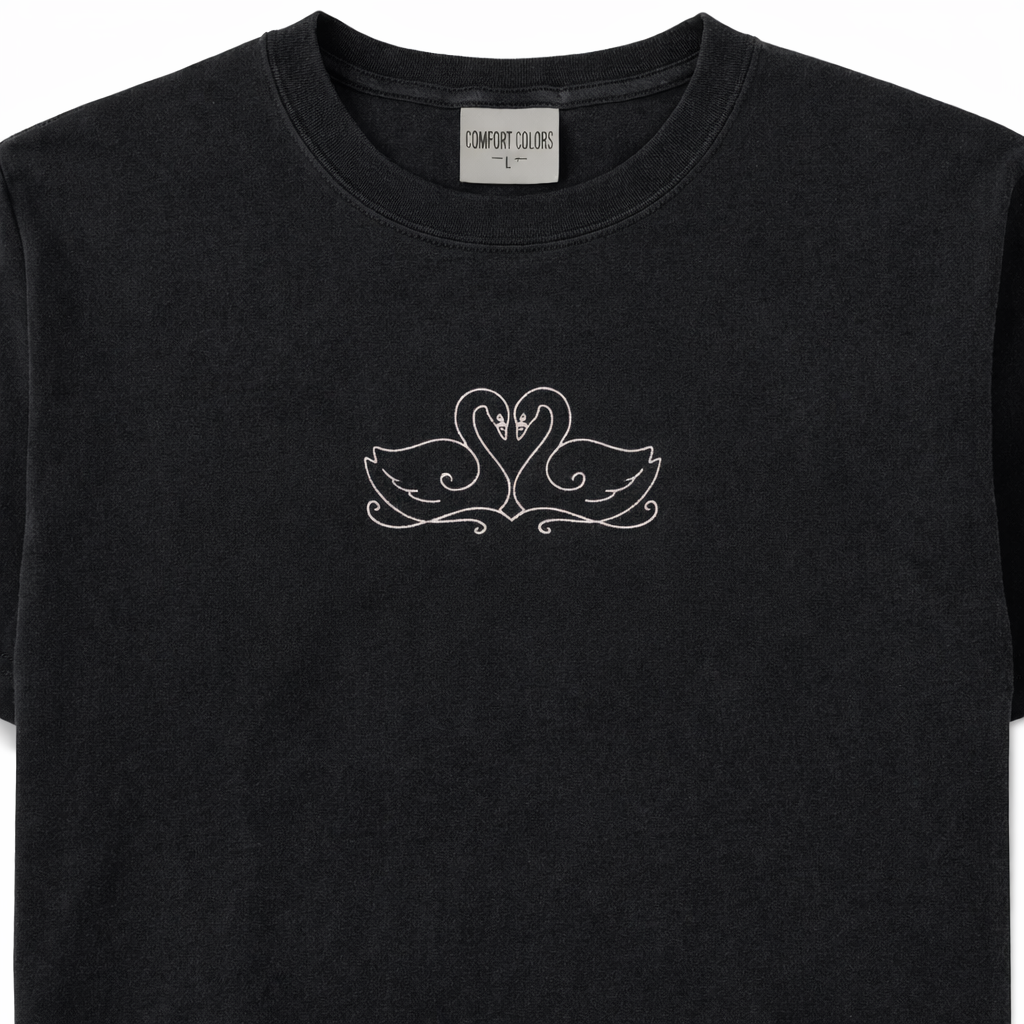 Black t-shirt with a white design on a white background