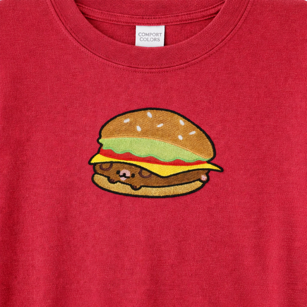 Crimson t-shirt with an embroidered design of a hamburger 